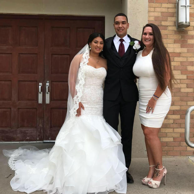 Cpl. Jordan Taylor, Jilia Arroyo and Theresa Johnson on Taylor and Arroyo's wedding day. (Photo courtesy of Theresa Johnson).