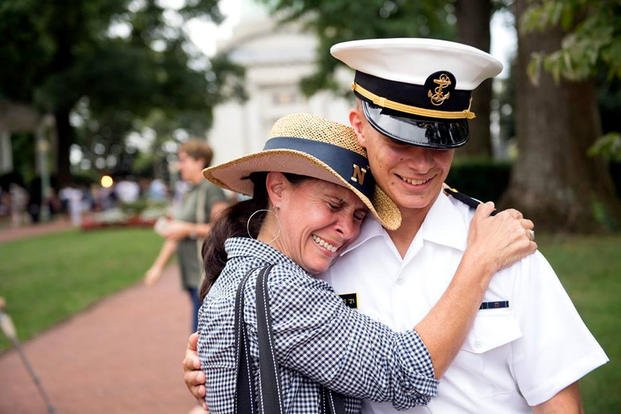  A mother embraces her son during Plebe Parents' Weekend at the U.S.Naval Academy in Annapolis. Maryland. (US Navy photo)