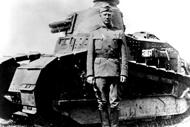 George S. Patton stands in front of a Renault FT light tank at Bourg, France in 1918. He was promoted to colonel on Oct. 17 of that year, after being wounded while leading six men and a tank in an attack on German machine guns near the town of Cheppy. (US Army photo)