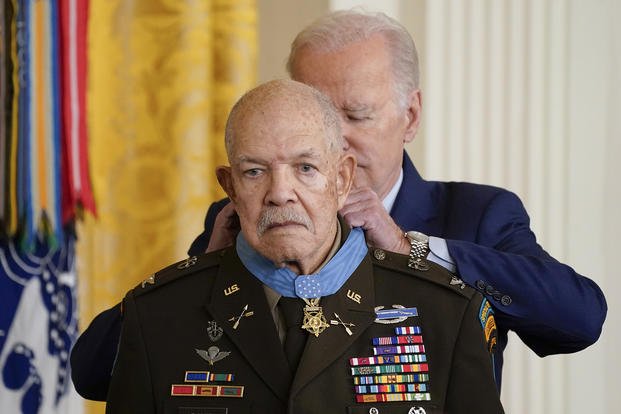 President Joe Biden awards the Medal of Honor to retired Army Col. Paris Davis for his heroism during the Vietnam War, in the East Room of the White House.