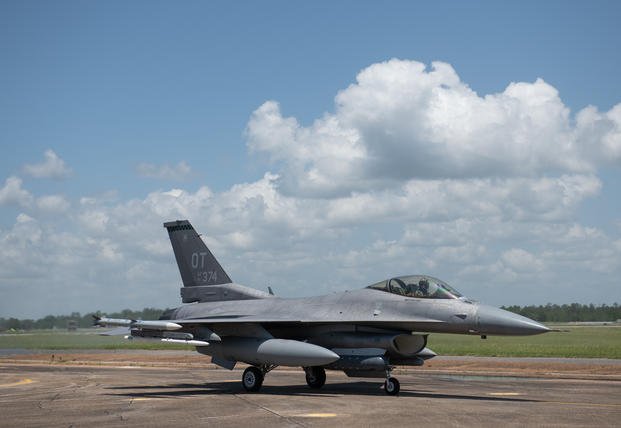 Brig. Gen. Scott Cain, 96th Test Wing commander, taxis down the runway in an F-16 Fighting Falcon during his fini flight at Eglin Air Force Base, Fla. June 16.