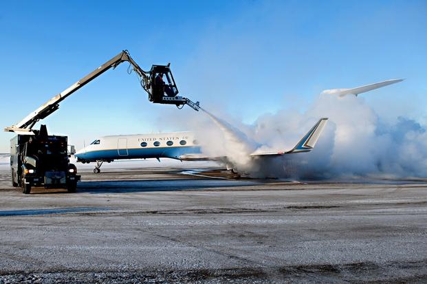 U.S. Army C-37B aircraft transporting Army Chief of Staff Gen. Raymond T. Odierno is de-iced before it departs Fort Richardson, Alaska Jan. 20, 2012.