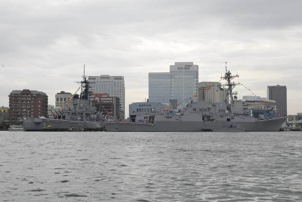 Guided-missile destroyer USS Nitze, right, is moored in downtown Norfolk celebrating Fleet Week Hampton Roads 2009.