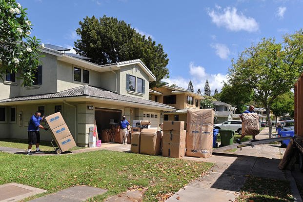 A household goods inspector performs an inspection of a household goods pack-out performed by movers in Hawaii in May 2021. 