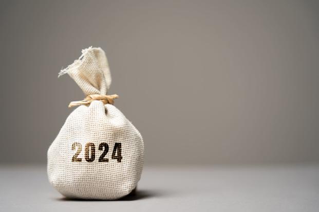 A little sack tied with string has 2024 printed on it