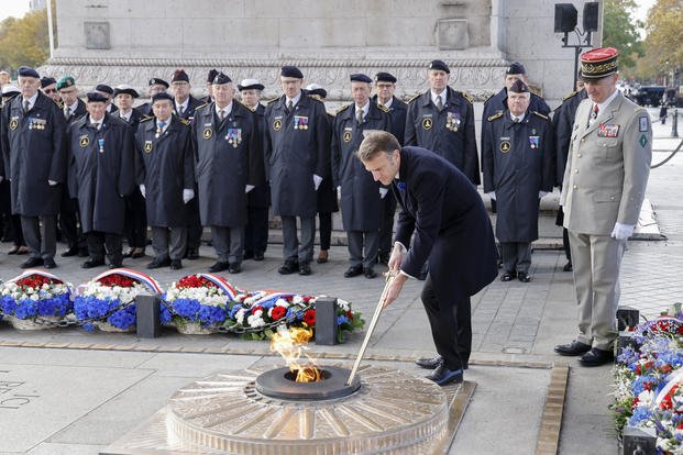 French President Emmanuel Macron at the Tomb of the Unknown Soldier in France. 