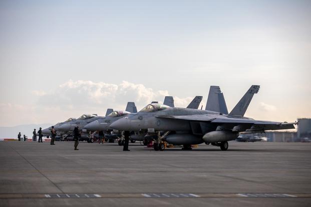 U.S. Navy pilots with Carrier Air Wing (CVW) 5, return to Marine Corps Air Station Iwakuni, Japan, Dec. 9, 2022.