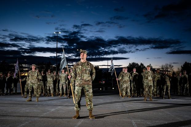 Air Force Colonel Timothy Paget, Individual Mobilization Augmentee to the Space Delta 9 commander and members of Space Forces' Delta 9 participated in a retreat ceremony at Schriever SFB, CO in front of building 210 on November 29, 2023.