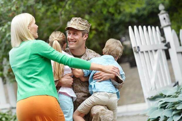 Servicemember with his family.