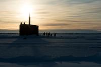 The fast-attack submarine Hampton surfaces through the ice in the Arctic. U.S. 2nd Fleet, which declared initial operational capability on Wednesday, now oversees all military missions and training on the East Coast and in the North Atlantic, where the Russians and Chinese have been active. (Mass Communication Specialist 2nd Class Tyler Thompson/Navy)