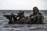 Navy SEALs conduct military dive operations off the East Coast of the United States.