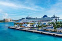 A cruise ship is docked in Freeport, Bahamas