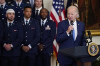 President Joe Biden presents the Commander-in-Chief's trophy to the Air Force Academy.