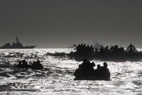 U.S. Navy SEAL candidates participate in Basic Underwater Demolition/SEAL (BUD/S) training at Coronado, Calif.