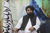 The Taliban's spokesman, Zabihullah Mujahid, sits during an interview in Kandahar, Afghanistan