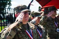 Technical sergeant selects salute the flag during promotion ceremony
