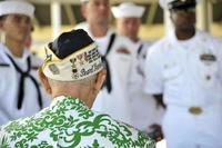 Sterling Cale, a Pearl Harbor survivor, speaks to sailors