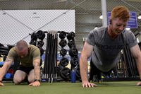 Airmen perform push-ups during the Memorial Day Murph Challenge at Aviano Air Base, Italy. (Airman 1st Class Cary Smith/U.S. Air Force photo)