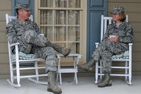 A dual Air Force couple relaxes on their porch at Seymour Johnson Air Force Base, North Carolina. (Photo: U.S. Air Force/Airman 1st Class Aaron J. Jenne.)